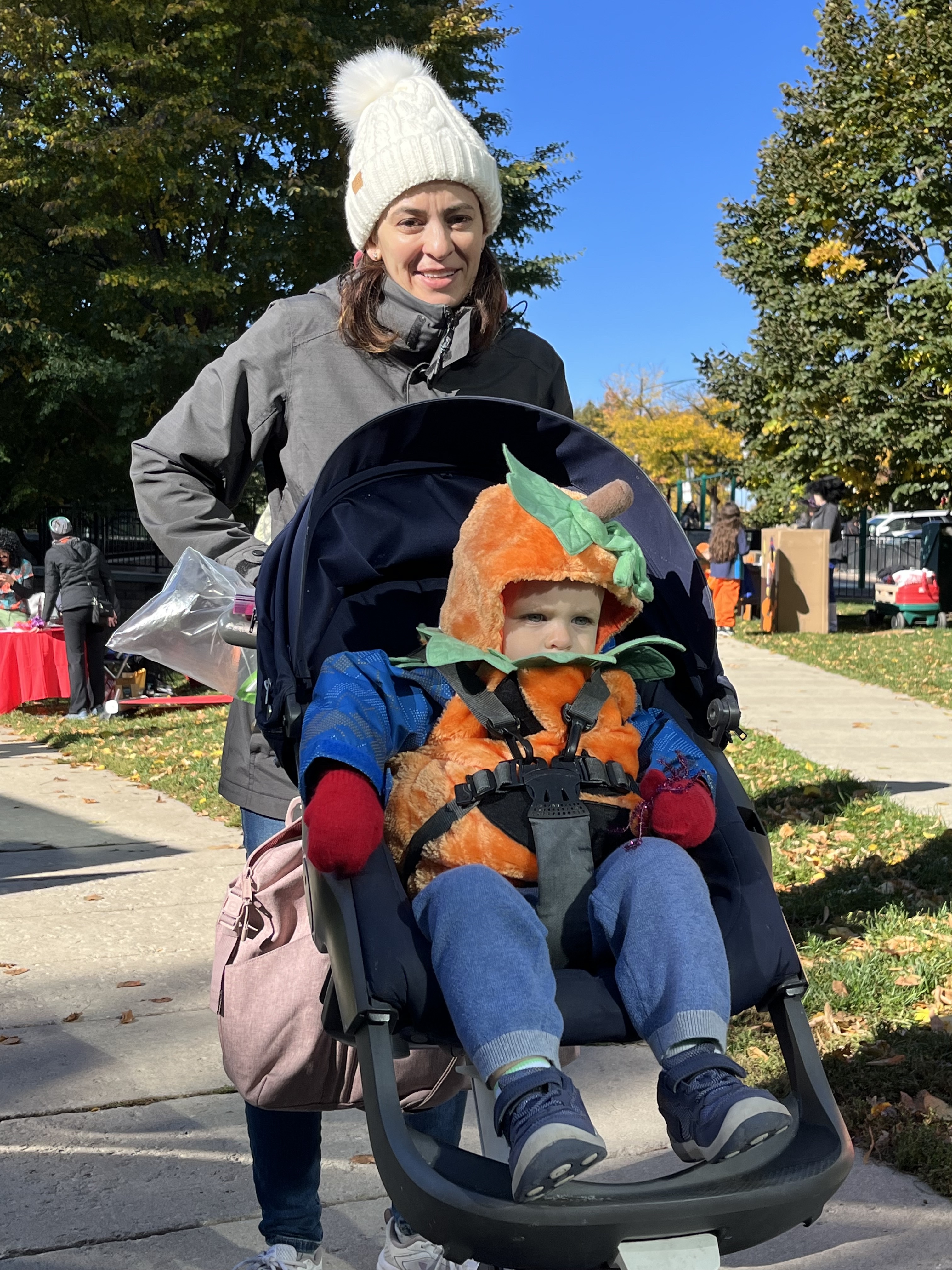 Mom with Pumpkin in Buggy