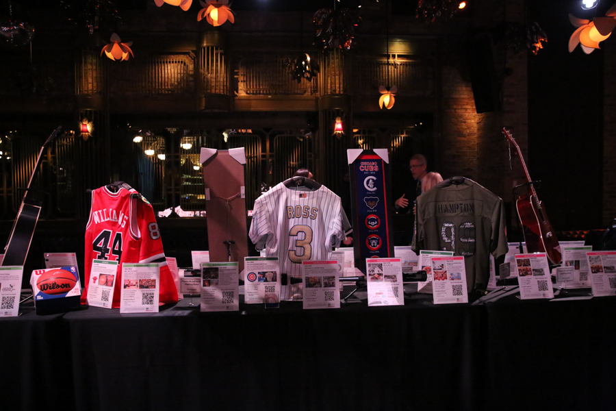 3N6A0009 - AUCTION TABLE - BULLS _ CUBS JERSEYS